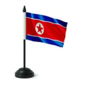 Miniatyrbild 1 av 3: Bordflagga från Nordkorea – 14 x 21 cm – Polyester – Svart Plastfot – Pixelforma