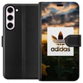 Pikkukuva 1 / 3: Yhteensopiva Lompakkokotelo Samsung Galaxy S23+ Adidas