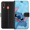 Pikkukuva 1 / 2: Yhteensopiva Lompakkokotelo Samsung Galaxy A20e Stitch kurottamassa eteenpäin värikkäässä kuvituksessa, jossa on kukallinen tausta