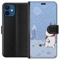 Pikkukuva 1 / 3: Yhteensopiva Lompakkokotelo Apple iPhone 12 mini Hahmo seisoo rauhallisessa talvimaisemassa, jossa sataa lunta. Siniset sävyt ja kuu luovat rauhaa, h