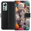 Miniatyrbillede 1 af 3: Kompatibel Tegnebogsetui til Xiaomi 12 Sovende killinger sammenkrøllet blandt farverige garnnøgler i en blød illustration