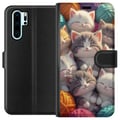 Miniatyrbillede 1 af 3: Kompatibel Tegnebogsetui til Huawei P30 Pro Sovende killinger sammenkrøllet blandt farverige garnnøgler i en blød illustration