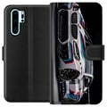 Miniatyrbillede 1 af 3: Kompatibel Tegnebogsetui til Huawei P30 Pro BMW M Power-illustration – nærbillede af sportsvogn i hvidt racerløbsdesign
