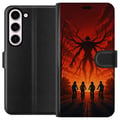 Pikkukuva 1 / 3: Yhteensopiva Lompakkokotelo Samsung Galaxy S23 Tumma Stranger Things -henkinen kauhuillustratsioon, jossa on punainen taivas, uhkaava hirviö ja pyörä