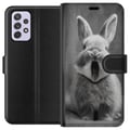 Miniatyrbillede 1 af 3: Kompatibel Tegnebogsetui til Samsung Galaxy A52s 5G Bedårende kanin i sort-hvid sidder forfra med åben mund, som om den gaber, hvilket skaber et char