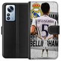Miniatyrbild 1 av 3: Kompatibelt Plånboksfodral till Xiaomi 12 Pro Real Madrid Jude Bellingham med försvarare i nummer 5 tröja stort klubbemblem svartvit kontrast atletis
