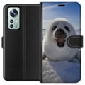 Miniatyrbillede 1 af 3: Kompatibel Tegnebogsetui til Xiaomi 12 Sælunge i sneen med stort smil og blød, rund form, sødt vintermotiv med arktisk stemning, perfekt til dyreelsk