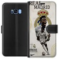 Miniatyrbild 1 av 2: Kompatibelt Plånboksfodral till Samsung Galaxy S8 Real Madrid Vinícius Júnior med anfallare i nummer 7 tröja klubbmärke vit matchdräkt energisk pose