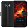 Miniatyrbillede 1 af 3: Kompatibel Tegnebogsetui til Samsung Galaxy S8 Apokalyptisk scene med brændende himmel og Hawkins-skilt i Stranger Things-stemning