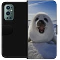 Miniatyrbillede 1 af 3: Kompatibel Tegnebogsetui til OnePlus 9 Pro Sælunge i sneen med stort smil og blød, rund form, sødt vintermotiv med arktisk stemning, perfekt til dyre