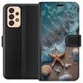 Pikkukuva 1 / 3: Yhteensopiva Lompakkokotelo Samsung Galaxy A33 5G Tähtikala ja simpukat rantadesign rauhallisine aaltoineen meren ja hiekan kera inspiroituna lomatun