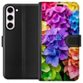 Pikkukuva 1 / 3: Yhteensopiva Lompakkokotelo Samsung Galaxy S23+ Hortensia hortensian kukat värikkäät kukat sateenkaari kukkakuvio violetti vaaleanpunainen sininen ke