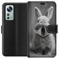 Miniatyrbillede 1 af 3: Kompatibel Tegnebogsetui til Xiaomi 12 Bedårende kanin i sort-hvid sidder forfra med åben mund, som om den gaber, hvilket skaber et charmerende, sjov