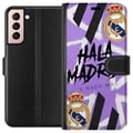Miniatyrbild 1 av 3: Kompatibelt Plånboksfodral till Samsung Galaxy S21 Lila Hala Madrid design med klubbemblem och kraftfull sportgrafik perfekt för fotbollsfans som äls
