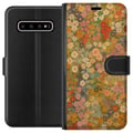 Miniatyrbillede 1 af 3: Kompatibel Tegnebogsetui til Samsung Galaxy S10+ Blomstereng i varme nuancer med en nostalgisk, malerisk stemning