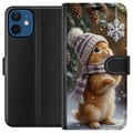 Pikkukuva 1 / 3: Yhteensopiva Lompakkokotelo Apple iPhone 12 mini Talvikani pipo ja huivi päässään ihailee lumihiutaletta hurmaava talviaihe täynnä joulutunnelmaa