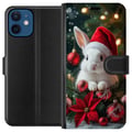 Pikkukuva 1 / 3: Yhteensopiva Lompakkokotelo Apple iPhone 12 Joulukani tonttulakilla söpö pupu talvi punaiset koristeet juhlava kawaii joulu kodikkaat valot juliste