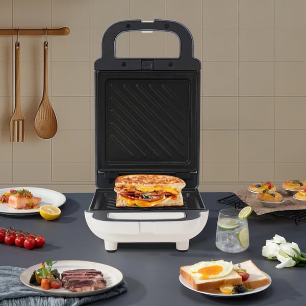 Elektrisk Sandwich Maker, 650W Effekt, 220-240V Spænding, Dimensioner 24cm x 15cm x 9.5cm, Non-Stick Belægning, Bagetid 3-5 Minutter