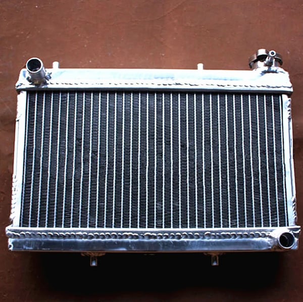 Radiator, Højkvalitets aluminium, Forbedret kølekapacitet, Designet til ATV TRX250R, Nem installation, Holdbar svejsemetode