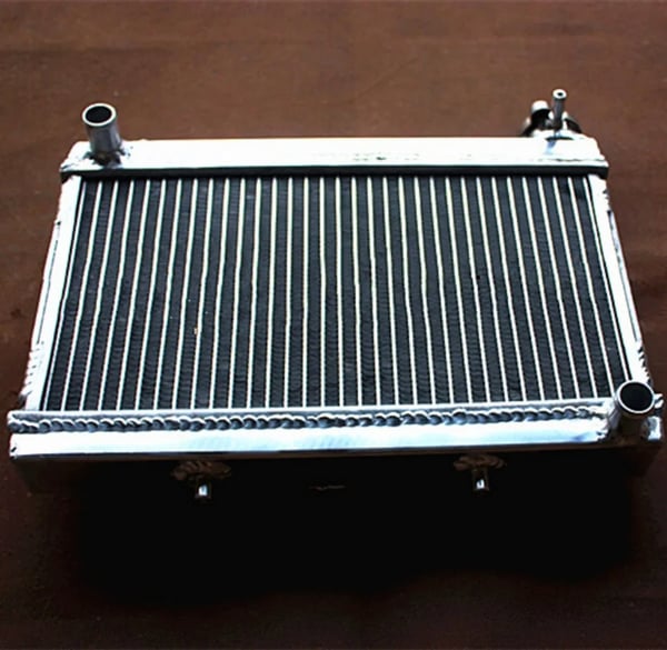 Radiator, Højkvalitets aluminium, Forbedret kølekapacitet, Designet til ATV TRX250R, Nem installation, Holdbar svejsemetode