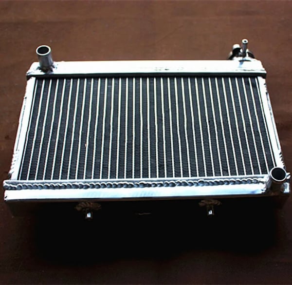 Radiator, Højkvalitets aluminium, Forbedret kølekapacitet, Designet til ATV TRX250R, Nem installation, Holdbar svejsemetode