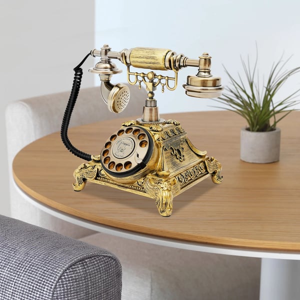Vintagetelefon, pyörivä numerovalitsin, johdollinen puhelin, koristeellinen yksityiskohta