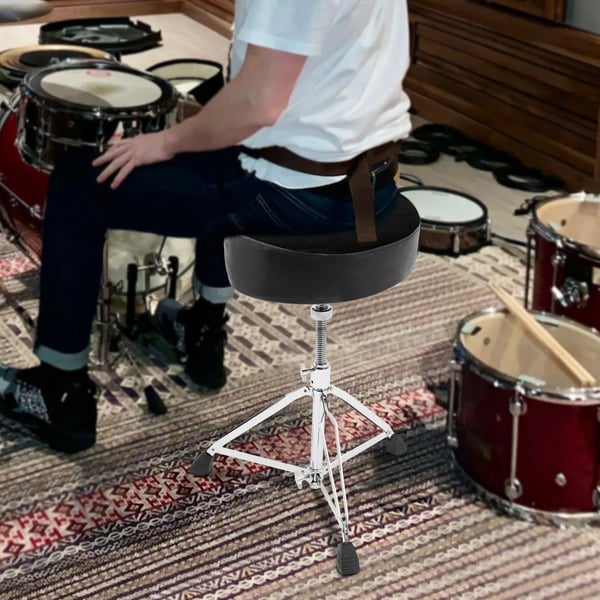 Trommestol, 100 kg kapacitet, højdejusterbar fra 45-68 cm, foldbart tripod design, ergonomisk PU-pude, kompakt og bærbar