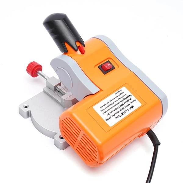 Mini bordsav - Bordrundsav - Effekt 90 W - Gæringssnit 45° - Klinge 5 cm 100T - Snitdybde 1,2 cm - Spænding 110–220 V - Orange/Sort