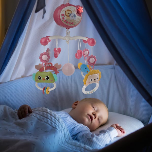 Baby uro til tremmeseng - Musikuro med projektor - Blinkende lys - Dyrefigurer - CE-certificeret - 7–12 mdr - Lyserød