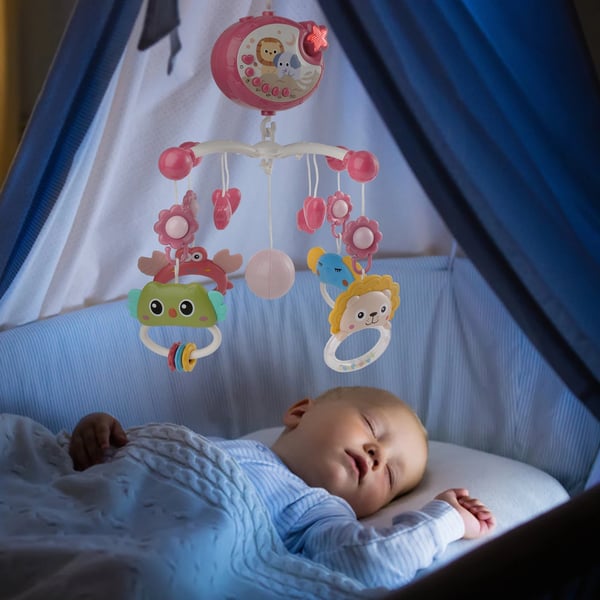 Baby uro til tremmeseng - Musikuro med projektor - Blinkende lys - Dyrefigurer - CE-certificeret - 7–12 mdr - Lyserød