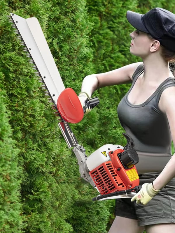Benzindrevet hækkeklipper/hækketrimmer - Totaktsmotor 22,5 cm³ - Klinge 70 cm enkeltsidet - Effekt 0,65 kW - Rekylstart - Skulderrem - Rød
