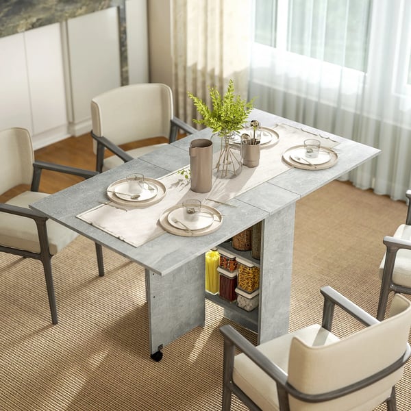 Matbord - Fällbart köksbord på hjul - 2 Hyllor - 2 Klaffar - 75x140x74 cm - För 6 personer - Ljusgrå