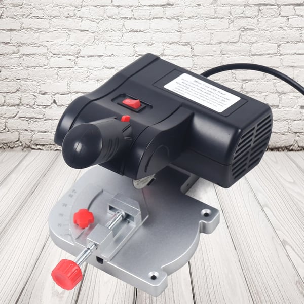 Mini bord kap-/geringssav - 90 W - 6000 omdr./min - 45° geringssnit - Snit metal 4–10 mm, ikke-metal (træ/plast) 12 mm - 2 klinger - DC - Sort
