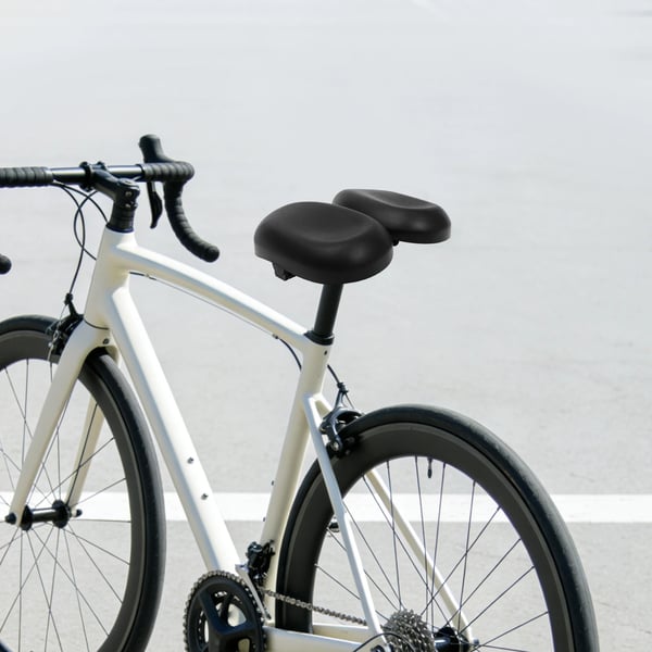 Cykelsadel - Næseløs sadel til racercykel - Ergonomisk design - Bred polstring - Trykaflastende - Unisex - Sort