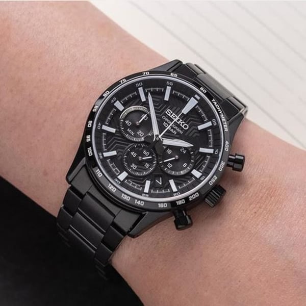 Klocka - SEIKO - Seiko sport chrono - Svart stål - Vattentäthet 10 Atm - Safirglas