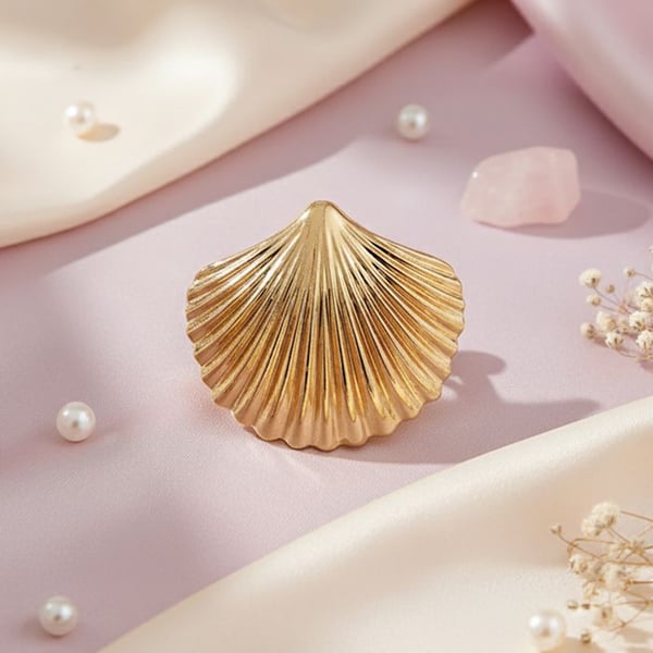 Barrette Casual Kaia Snäckskal Sol Guld Svart / Guld