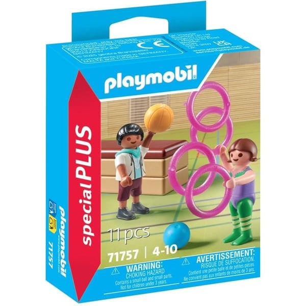 Två barn med gymnastikmaterial