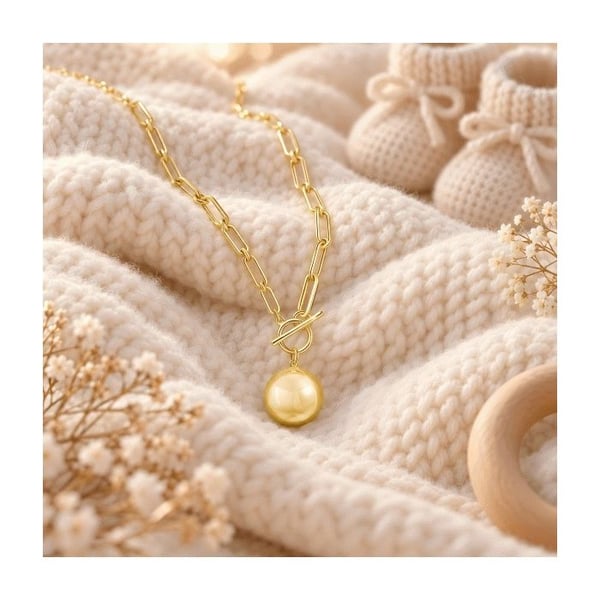 Chunky stickad gravid bola gold