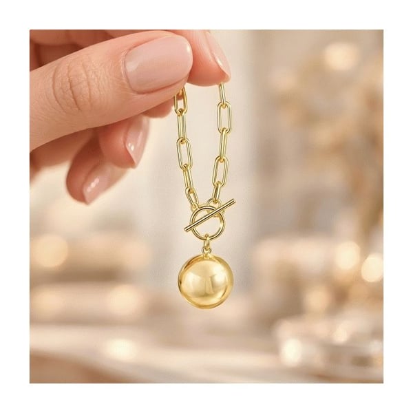 Chunky stickad gravid bola gold