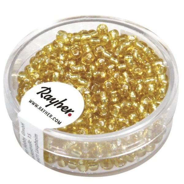 Rocailles,2,6 mm av. silverdetalj, låda 16 g, guld