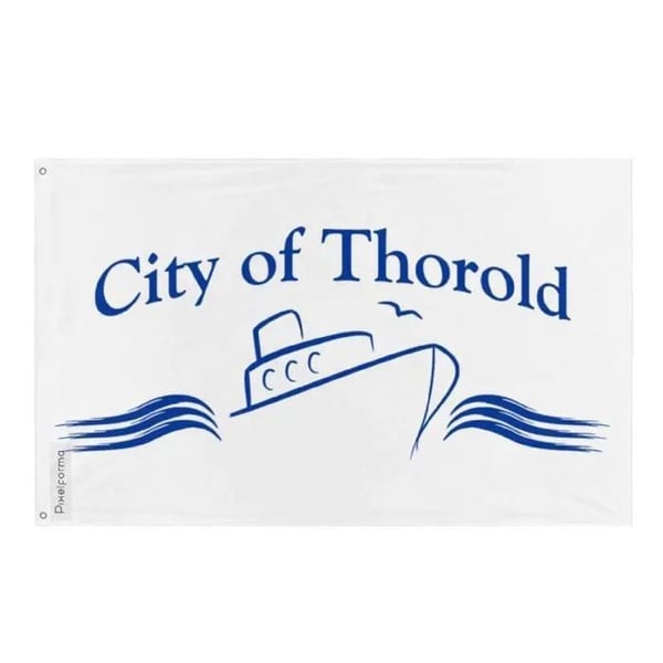 Thorold Flagga – 96 x 144 cm – Hållbar Polyester – 2 Metallöglor – Inomhus / Utomhus – Pixelforma
