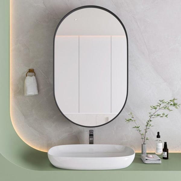 Elegant oval spejl, integreret medicinskab, vægskab med metalramme, sort