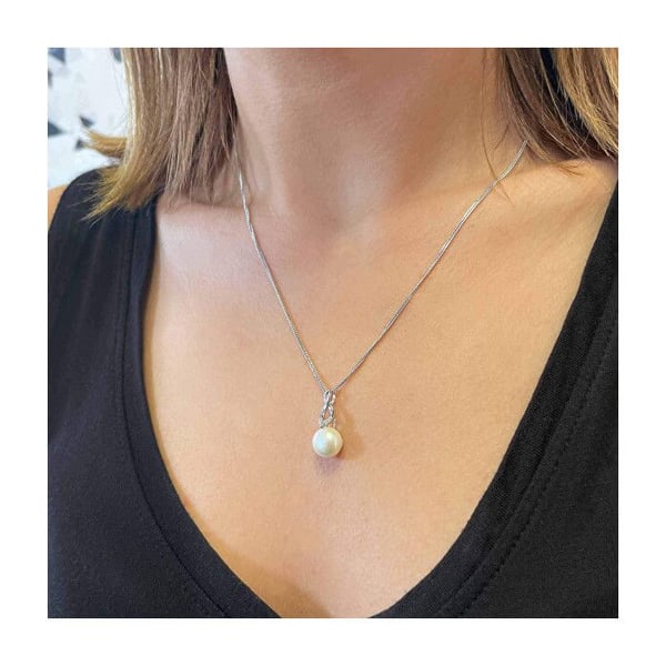 Smyckeset i silver med cubic zirconia och äkta pärlor 29052.1B (örhängen, kedja, hänge)