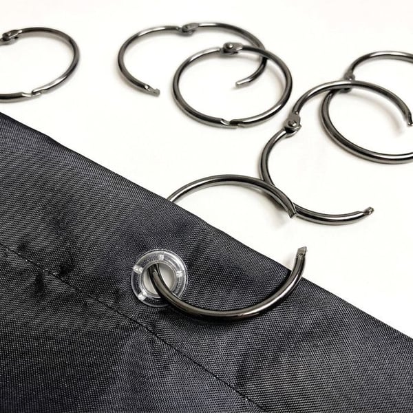 Paket med 12 duschgardinsringar RINGO SMALL Svart Titan Spirella
