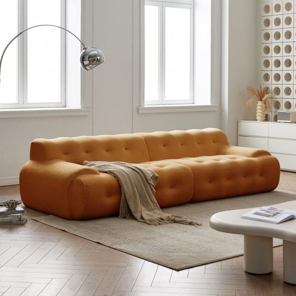 Rullad tygsoffa i färgen orange