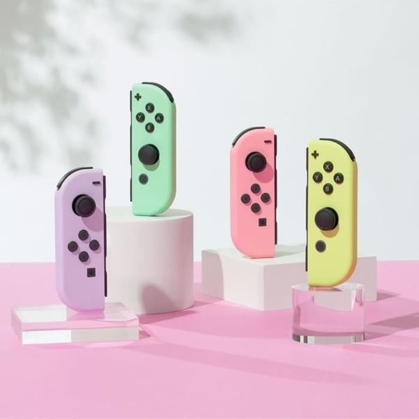 Ett par Pastell Purple & Pastel Green Joy-Con-kontroller för Nintendo Switch