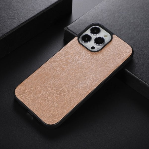 iPhone 14-deksel med glitterflak og metallogo i gull