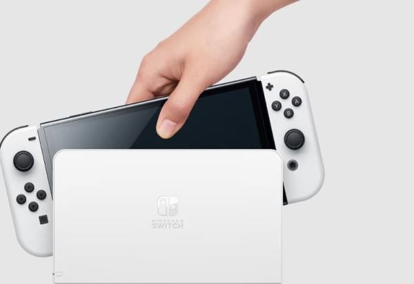 Nintendo | Switch OLED - Spillkonsoll - Full HD - 64GB - Hvit | Inkl. 2 x Joy-Con (hvit)