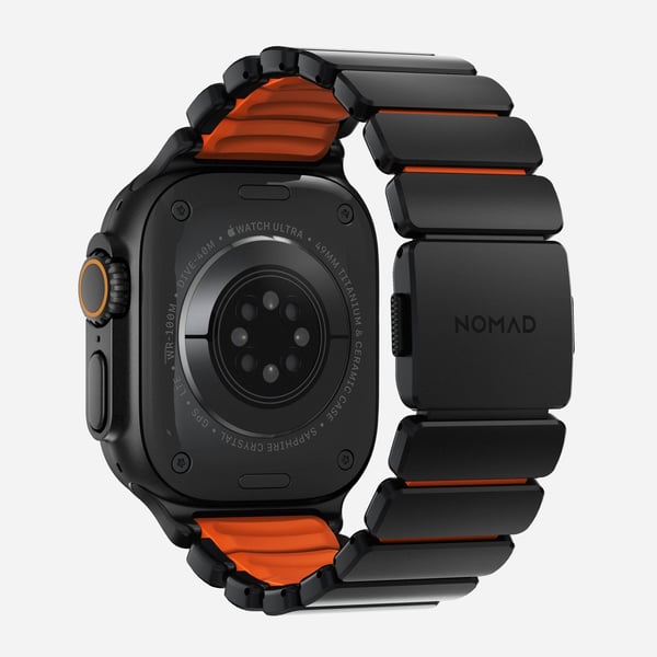 Nomad Stratos Apple Watch -ranneke, 49 mm, titaani/FKM, musta/oranssi