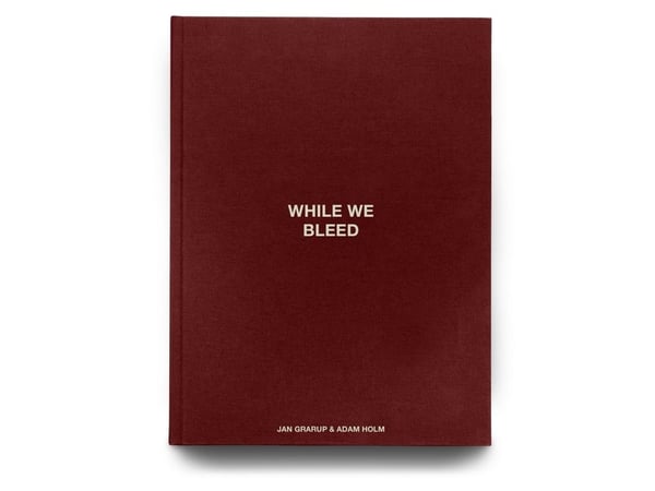 WHILE WE BLEED | Jan Grarup, Adam Holm | Språk: Engelska